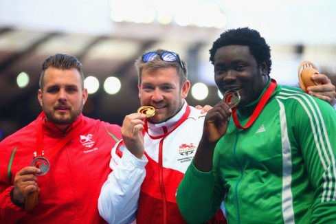 (L-R) Silver medallist Aled Davies of Wales, GOLD medallist Dan Greaves of England and Bronze medallist Richard Okigbazi of Nigeria for F42/44 Discus at 2014 Commonwealth Games! (Photo Credit: Julian Finney/Getty)